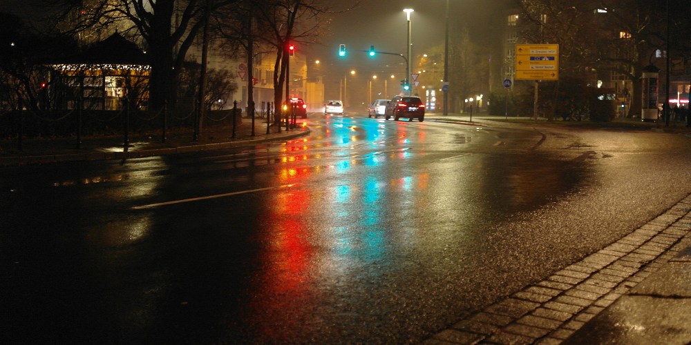 scriptorium_street lights on a wet street_scene noir