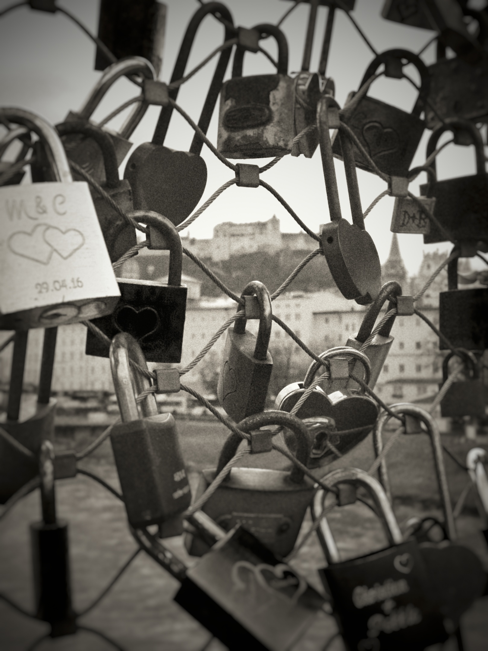 castle-in-the-distance_locks_Salzach_love_bridge_1